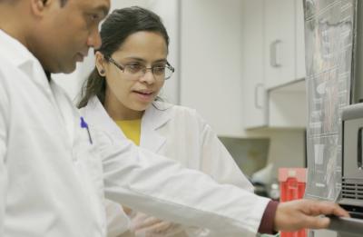 Sumi Regmi and Professor Mitra in the lab.