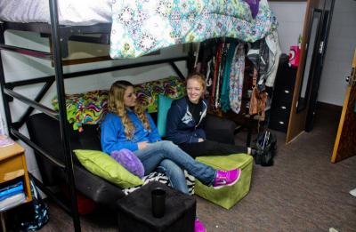 Students talking in the dorm