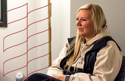 Stout student engages in hands-on experience with counseling exercise.