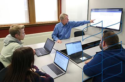 UW-Stout students collaborate in communications lab.