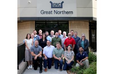 A group of alumni at their employers, Great Northern Corporation