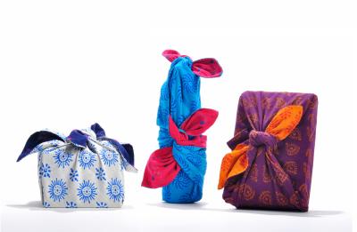 Set of three colorful fabric-wrapped boxes (Photo by Sandra Harris on Unsplash)