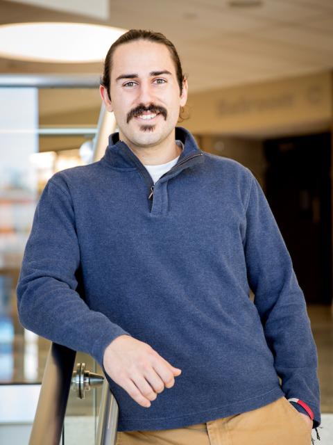 Supply chain management inspiring graduate Greg Cops, pictured in the Memorial Student Center.