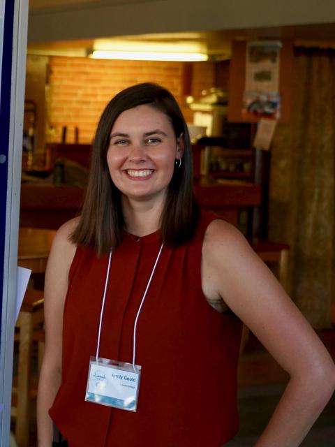 Emily Gould poses with her research poster