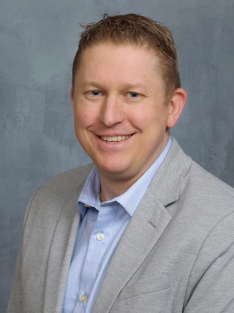 Portrait of Shaun Zahradka, online management graduate.