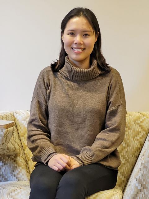 Jeongwon Kim at a student lounge in Harvey Hall.