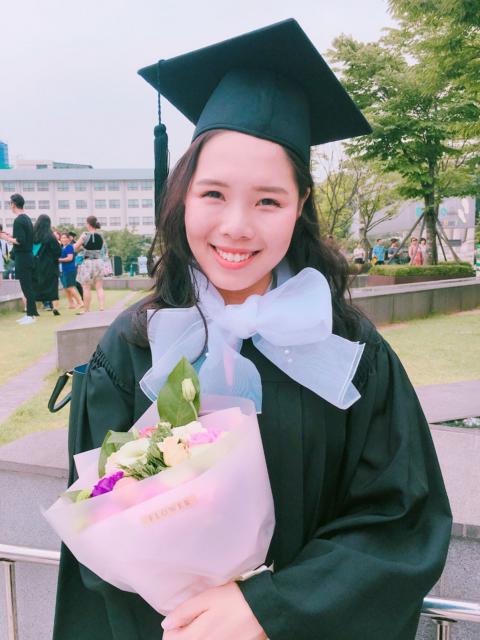 Jeongwon Kim celebrates receiving her bachelor’s from Hankuk University.