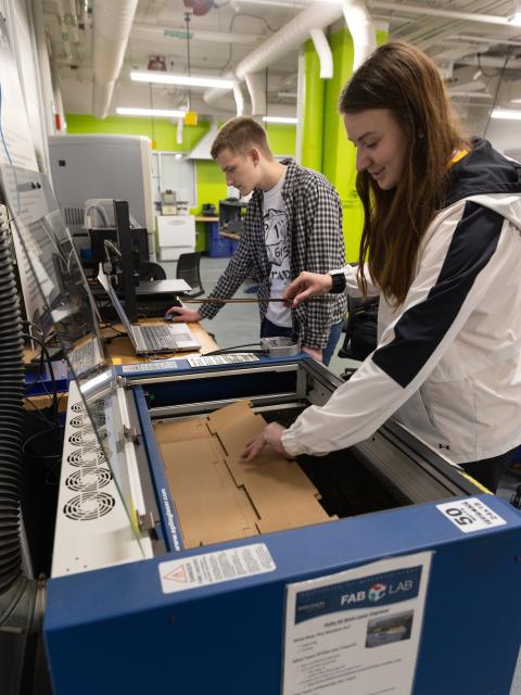 Students use the equipment in the UW-Stout Fab Lab.