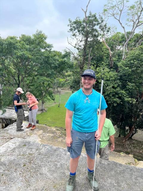 Hunter Kuester at the top of Temple IV, in Tikal National Park. Photo by Hunter Kuester