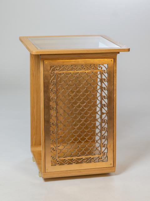 Jordan Jentsch's side table design incorporating a brass grate