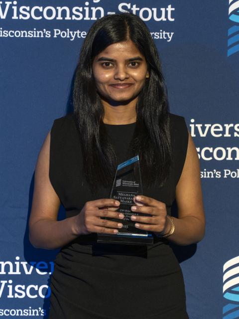 Meghana Maske with her Outstanding Cooperative Education and Internship Program Student of the Year award.