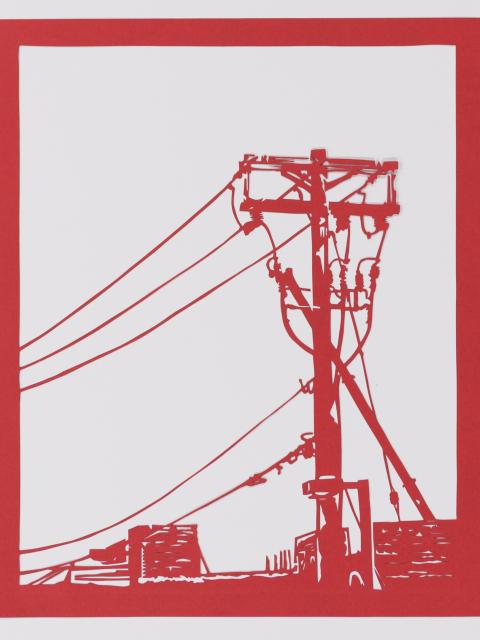 A papercut image of a telephone pole